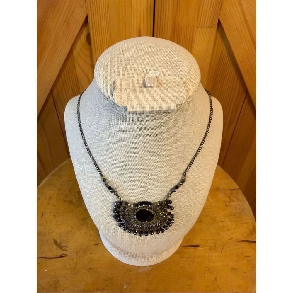 Anthropologie necklace features a black and gold art deco design (7357)